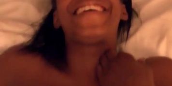 Horny black couple having good time inside the bedroom