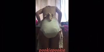 Pookie messing while doing dishes