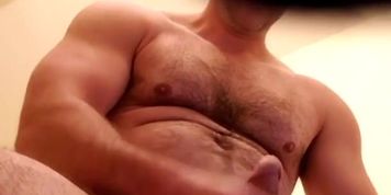 Muscle bear gives you a view from below and drops a load!
