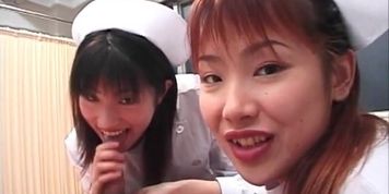 Seductive Asian nurses take turns in eating shaft in 3some