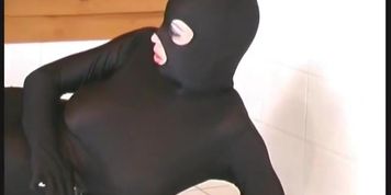 Blonde Kata Model in black catsuit