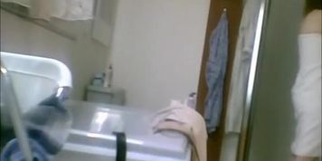 Hairy wife spied in bathroom after shower