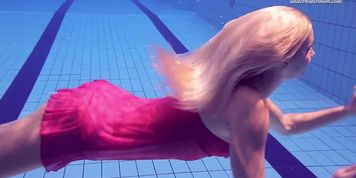 Elena Proklova shows how sexy can one be alone in the pool