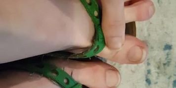 Tops of Feet in Flip-Flops