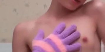 Chick With Small Titties Rubs Herself With Gloves