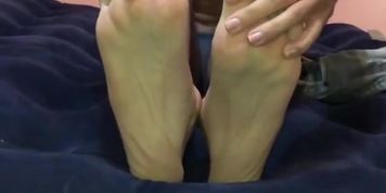 Young Employee Shows Off His Feet
