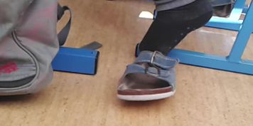 School birkenstocks shoeplay under chair