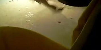 Spy toilet pee cam shot of a cute girl spreading her crutch