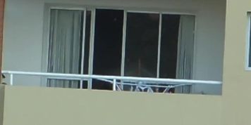 voyeur girl nude in balcony  argentina . far away ( 200 m)