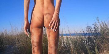 Nudist beach, getting sand off my round ass, in France