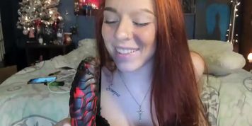 Amazingly hot redhead girl sucks dildo and twerks