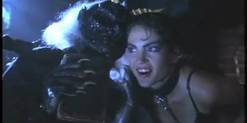 Brinke Stevens Thong Scene  in Teenage Exorcist