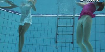 Hotly dressed teens in the pool (Sexy couple)