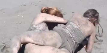 Rolling beach catfight