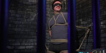 Blindfolded stud gets his ass spanked by dom