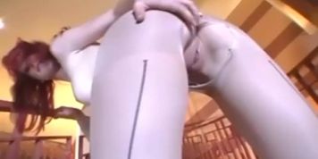 Redhead licking her toes and masturbating in ripped pantyhose (Justine Joli)