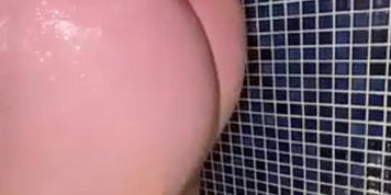 Grace Charis slight pussy slip & water play in shower