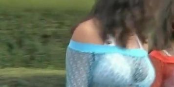 Sexy booty shorts video of a busty chick enjoying a festival