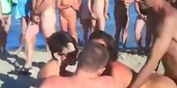 Beach Voyeur - two couples tart's on beach.