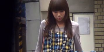 Odd asian pissing public