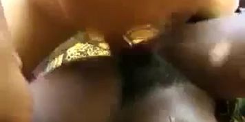 Black vixen with firm body and hairy pussy rides white cock on beach