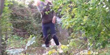 Redheaded Babe Pisses Long And Rough In Trees