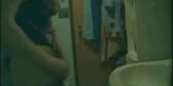 Chick masturbates on hidden cam in the bathroom