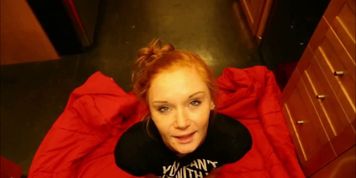 Skinny redhead blowing cock