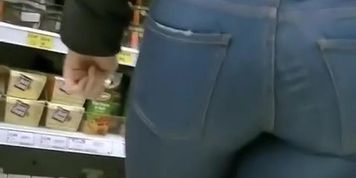Candid tight ass on teen wearing tight jeans