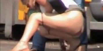 Kinky girl pissing in the public and voyeured on cam