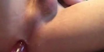 Sissyboy plays with dildo