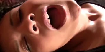 Mixed race cutie works her pussy with a vibe