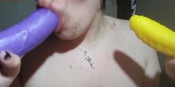Goth tries to do a double blow job with dildos