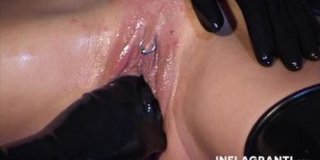 INFLAGRANTI - Gorgeous lesbian gets fisted in fetish scene