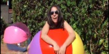 alex beachball pop poolside in micro bikini