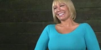 Big butt MILF chained to table and double fucked.
