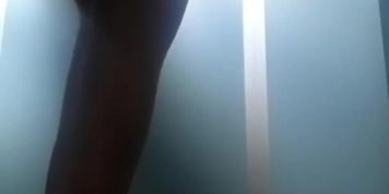 Jerking off and show his ass in a public toilet 