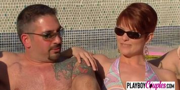 This horny couple is having a sexy swinger threesome while taking a hot shower.