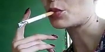 Sexy brunette Milf smoking and pumping