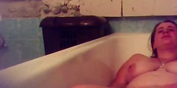 Orgasm of my mom in bath tube Hidden cam