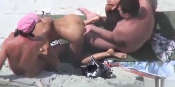 Public foursome at the nude beach