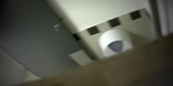 Blonde filmed from above when taking a pee