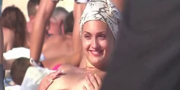 Topless Beach Cheeky Nipple Stimulation (horny hottie makes her nipples rough on the public beach)