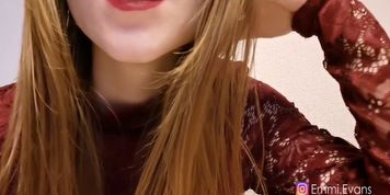The girl with red lips whispers ASMR