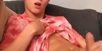 Cute blonde twink plays with his cock