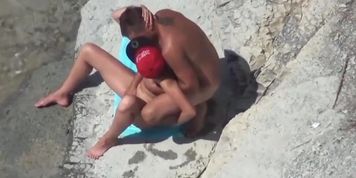 The couple was caught while masturbating on public beach