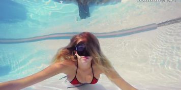 Blonde big boobs long hair Sophie Murena enjoys pussy in the pool