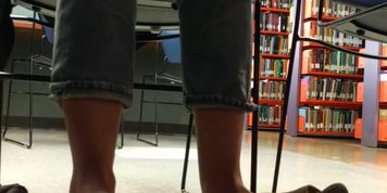 Candid feet dangle