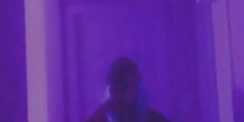 goth teen listens to lil peep while smoking and stripping in the mirror