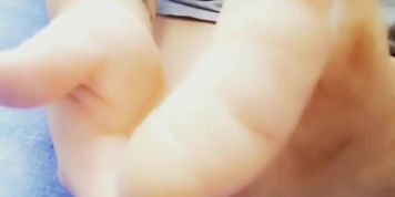 Toe amputee rubbing her foot 